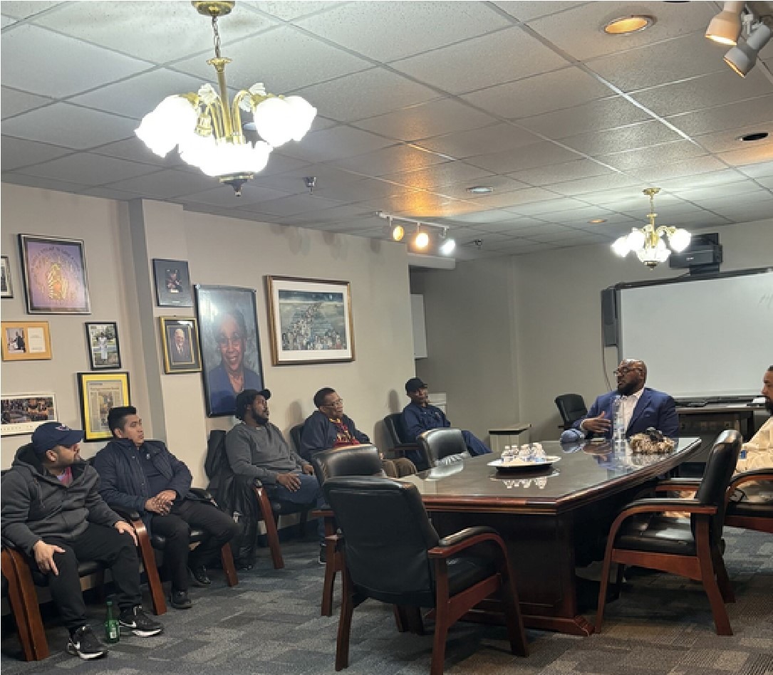 Men of Mazique having a meeting