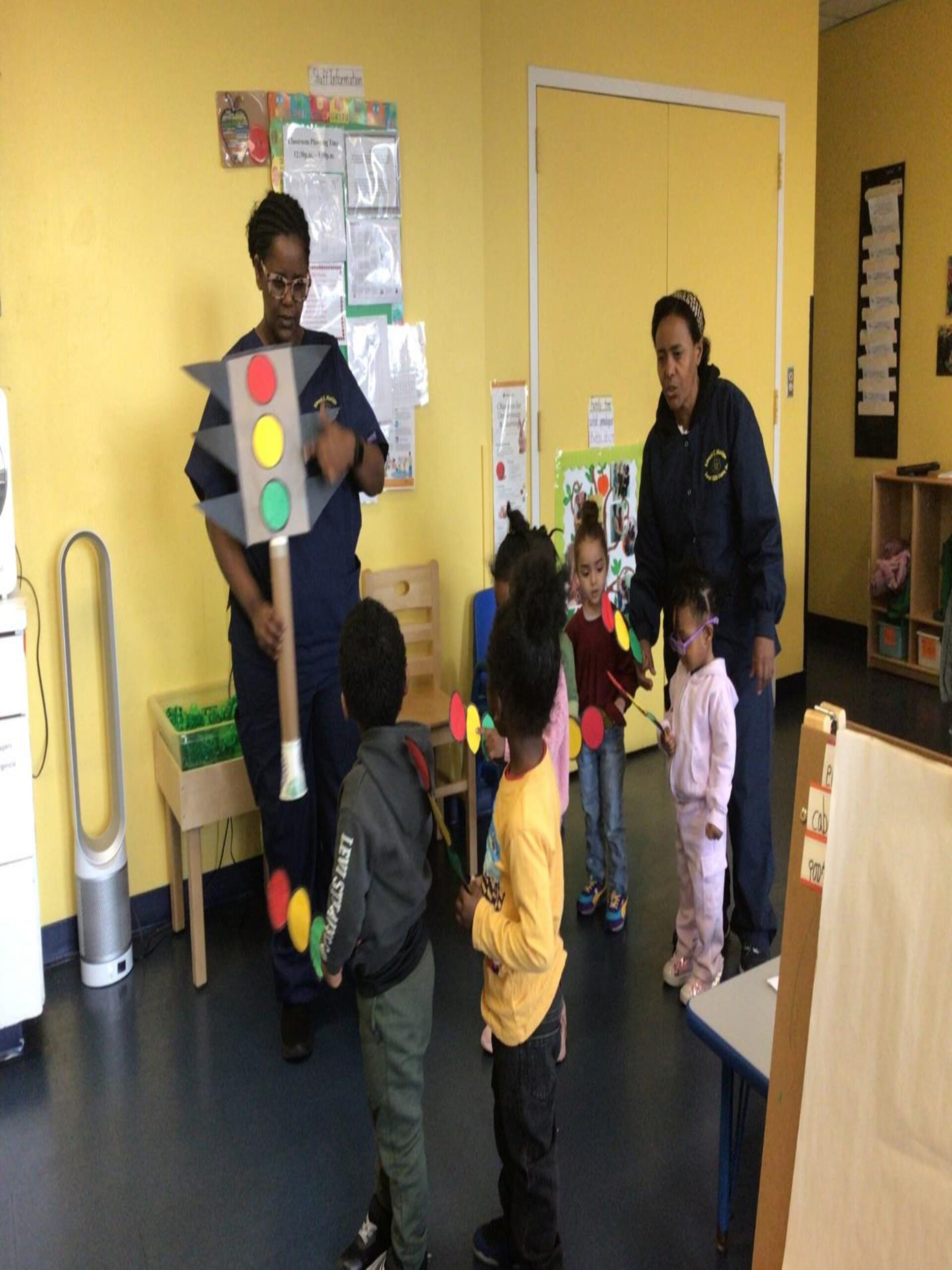 Teachers engage preschoolers in a traffic safety lesson